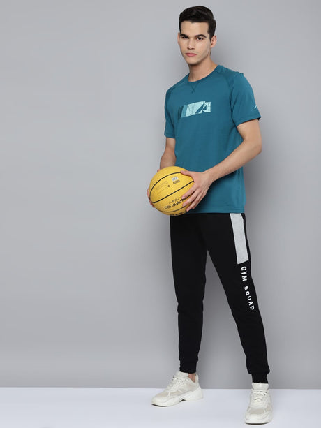 Alcis Men Teal Printed Slim Fit Running T-shirt | Alcis
