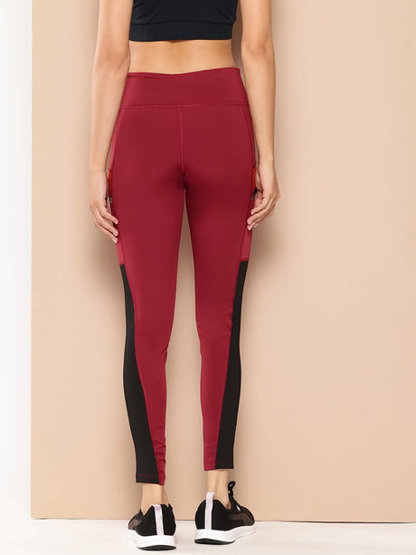 Alcis Women Maroon and Orange Colourblocked Tights