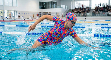 VIVA Swimming LOVE sublimated pattern, ared A-line Half sleeve Top paired with attached boy leg sublimated pattern, ared A-line sleeveless Top paired with attached boy leg - lifestyle shot
