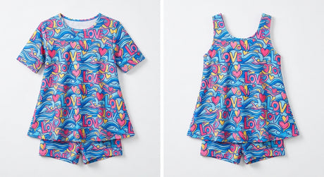VIVA Swimming LOVE sublimated pattern, ared A-line Half sleeve Top paired with attached boy leg sublimated pattern, ared A-line sleeveless Top paired with attached boy leg - studio shot